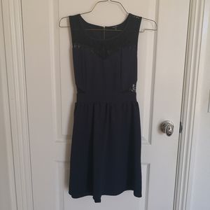 Navy dress with black lace cutouts